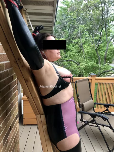 Tied to the cross in latex on the deck. Too bad my neighbors aren’t more observant! [F] OC