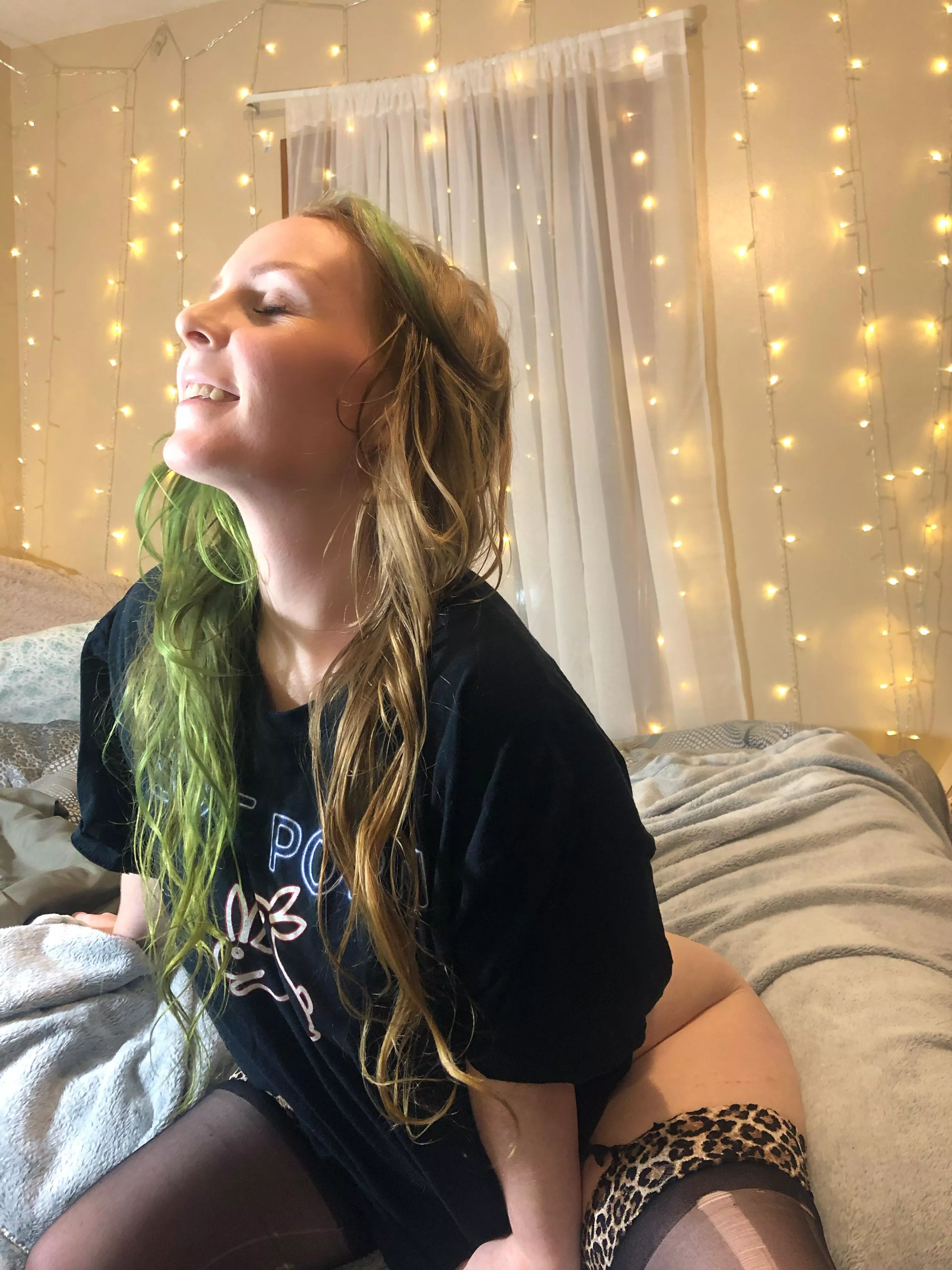 T-shirt and thigh highs moment.