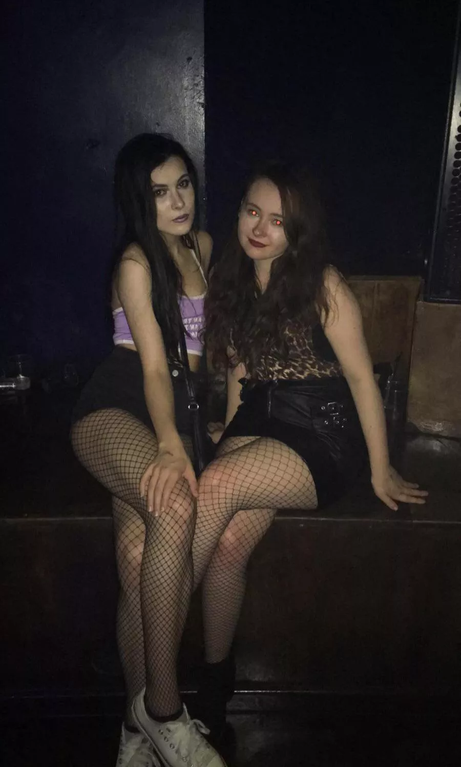 Two fishnet cutie ravers, whose side are you on? Two fishnet cutie ravers, whose side are you on?