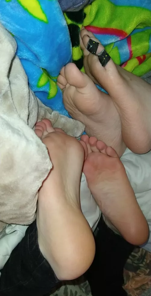 Two pairs of cute tomboy feet right in your face! Two pairs of cute tomboy feet right in your face!