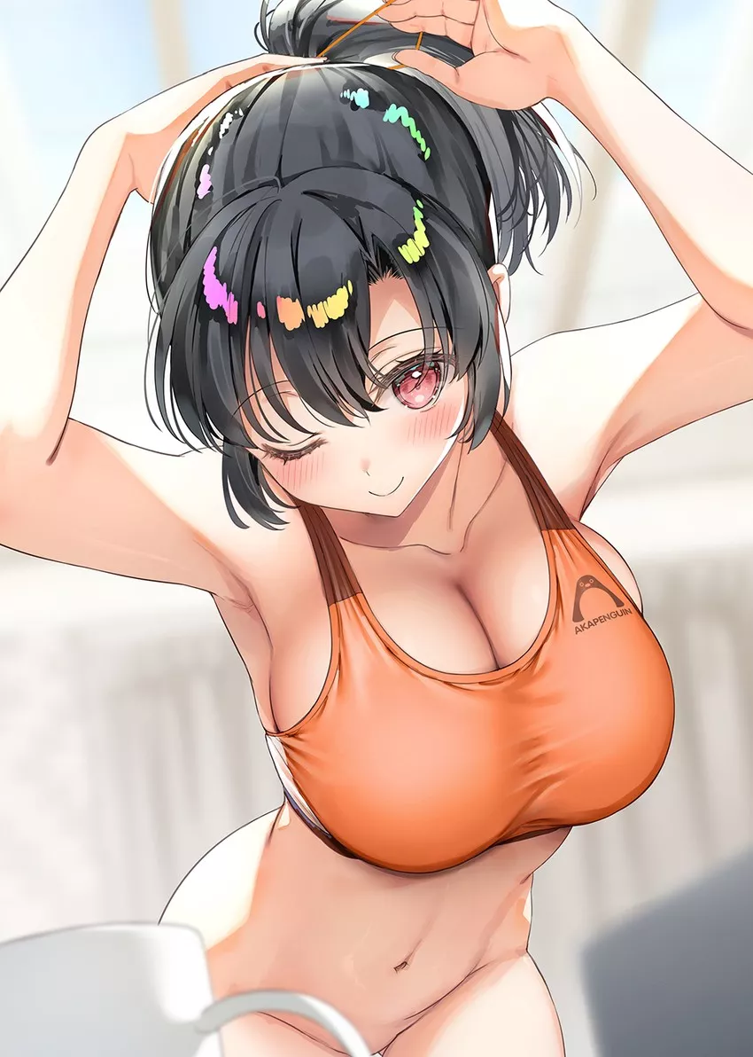 Tying her hair Tying her hair