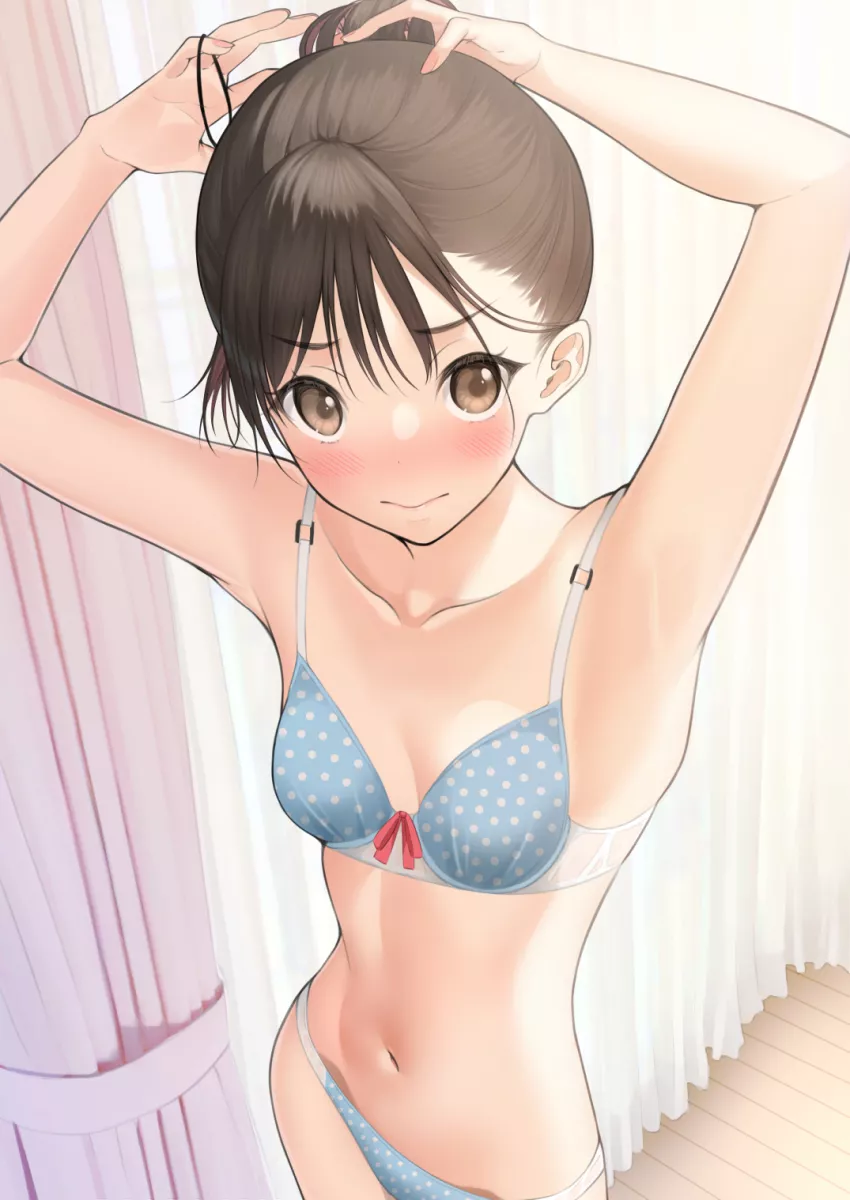 Tying her hair up Tying her hair up