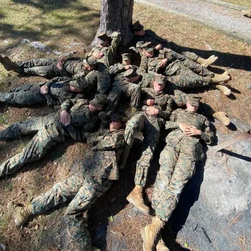 Uniformed Marines in a dogpile Uniformed Marines in a dogpile