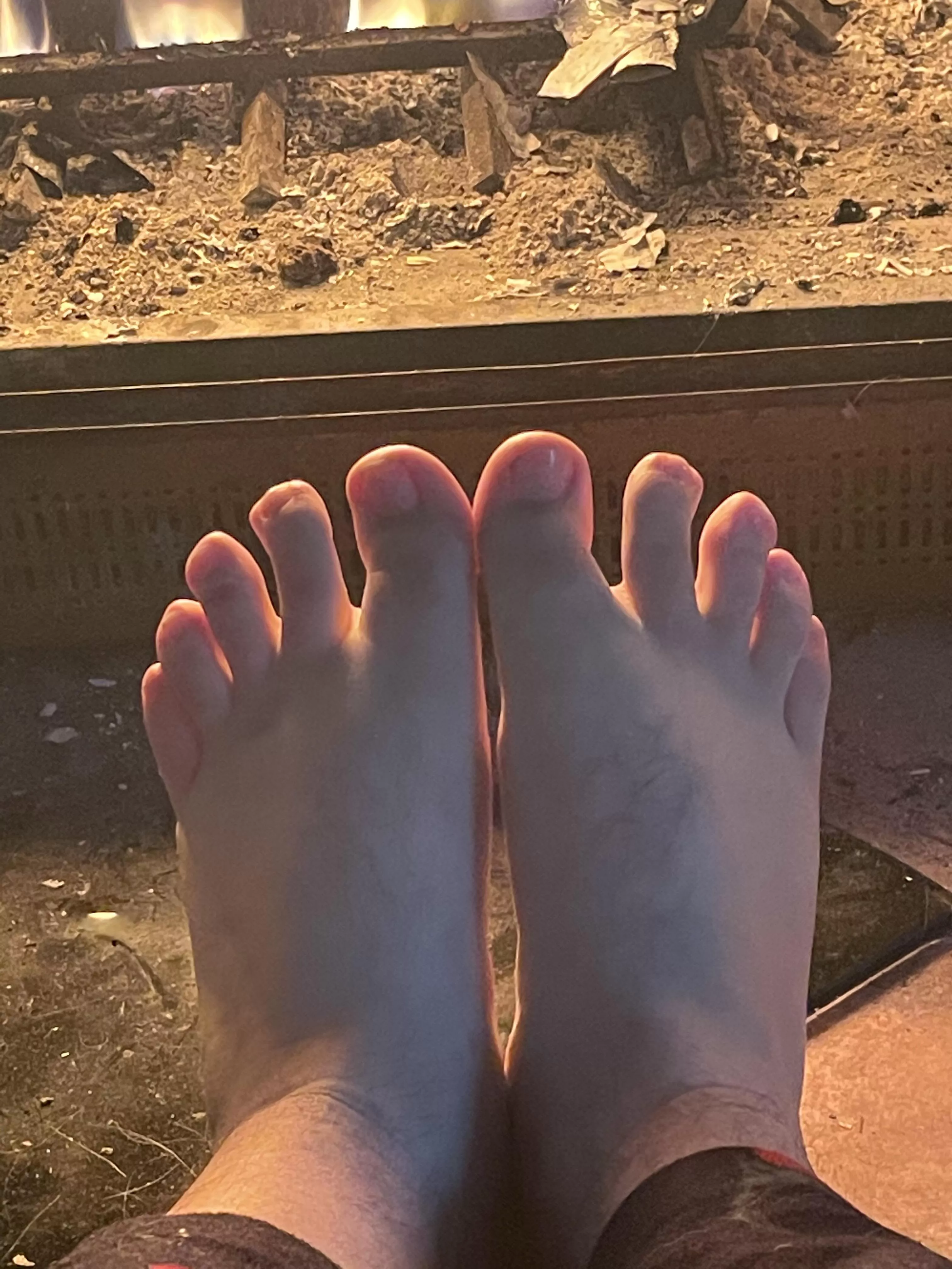 Warming my toes by the fire… would much rather your mouth ;)