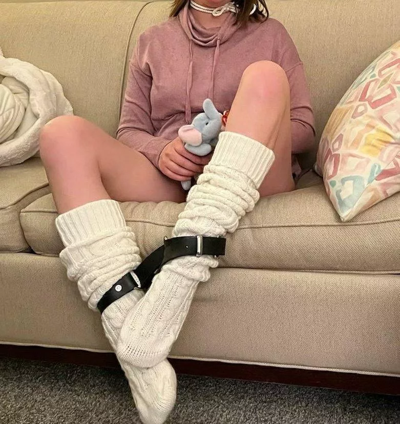 Watching a Disney movie with my favorite stuffie, fluffy socks, and daddy’s belt.