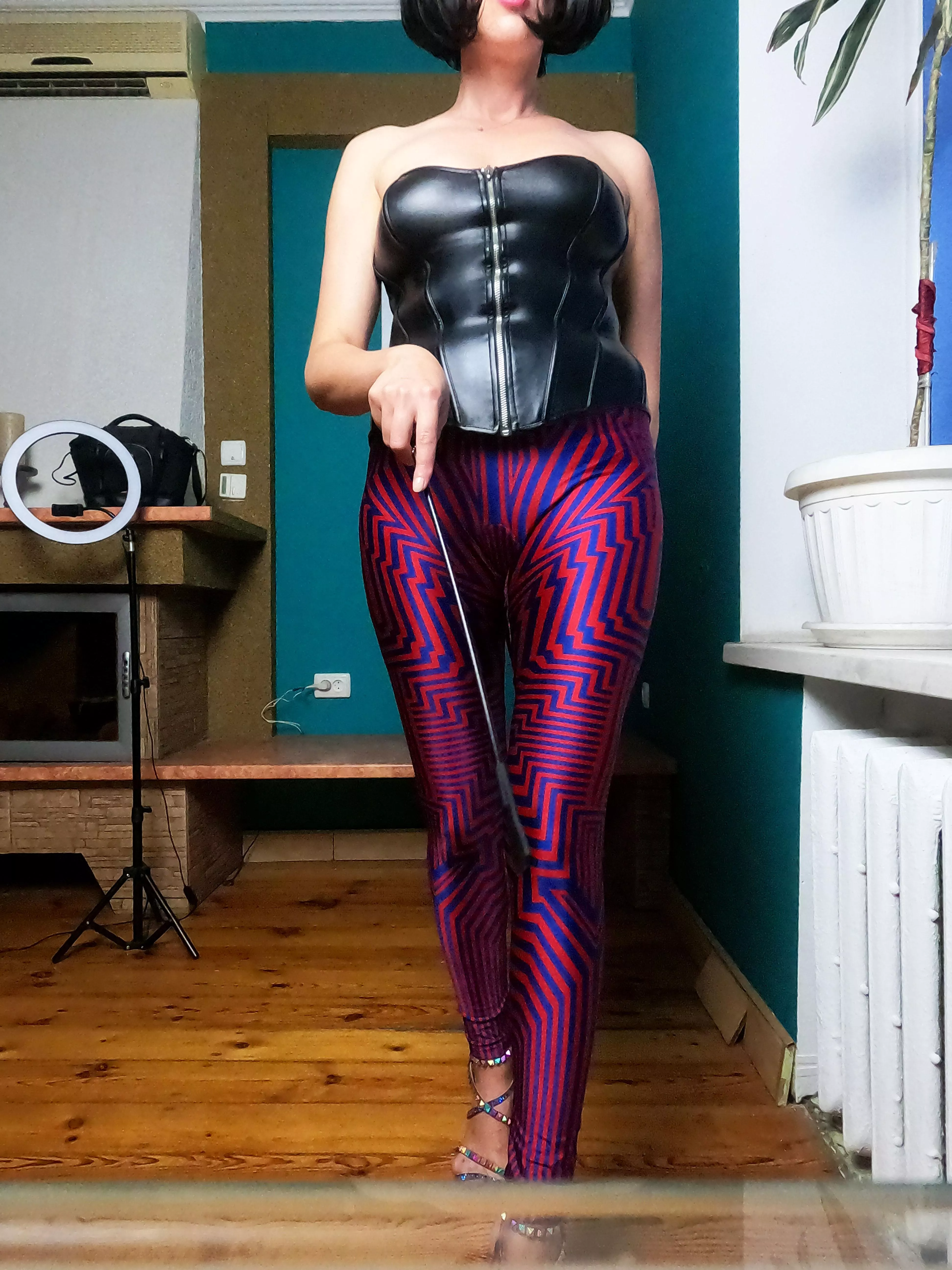 Wearing bright silky leggings and leather corset, can you resist? Wearing bright silky leggings and leather corset, can you resist?
