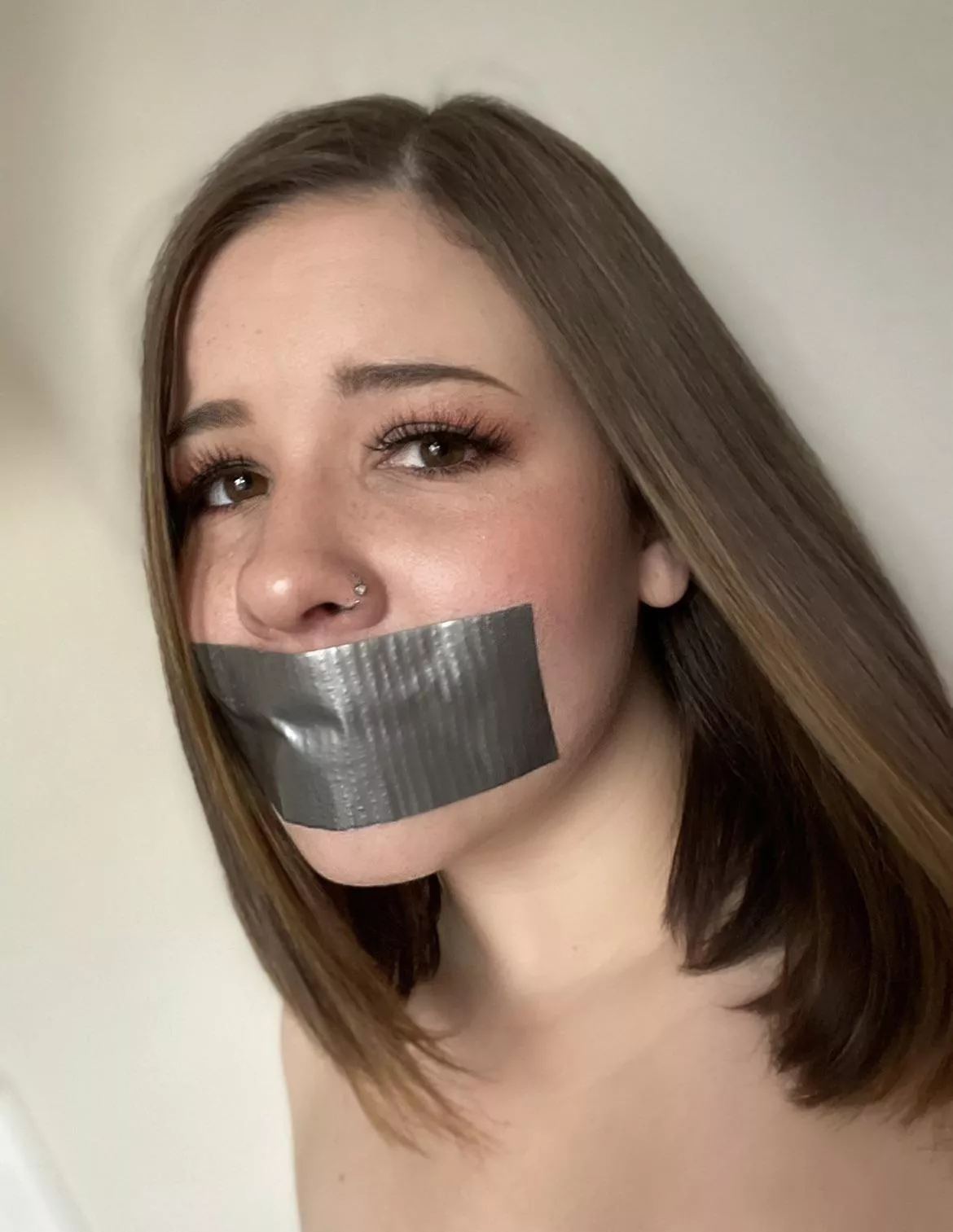 What would you do to this duct taped little slut? ??