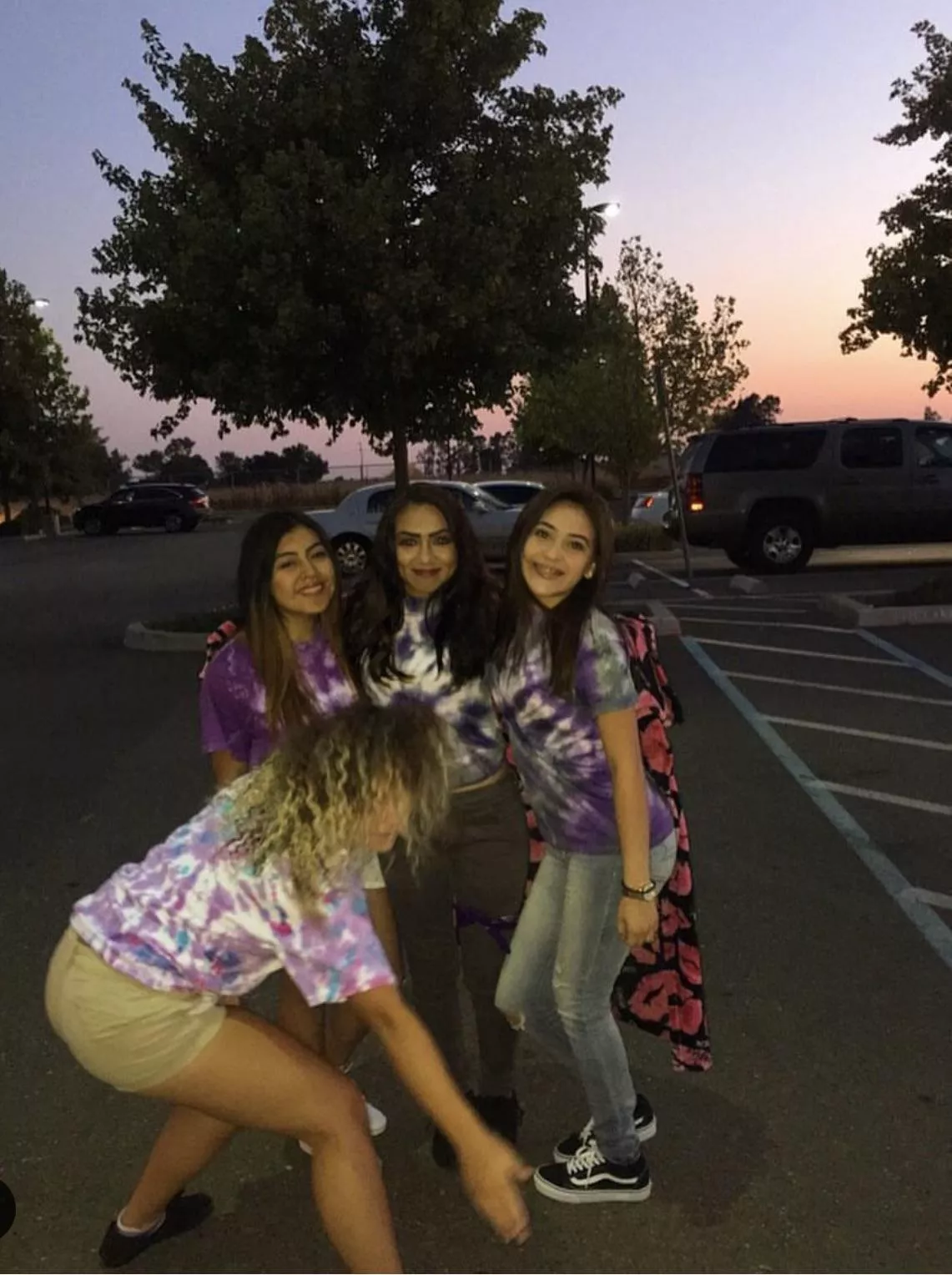 Which cutie in the dyed shirt ?