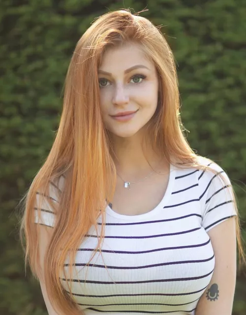 Who is this busty?