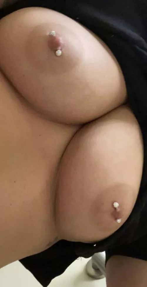 Wife’s pierced tits.