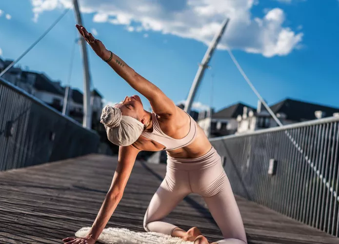 Yoga girl under the blue skies and sunshine Yoga girl under the blue skies and sunshine